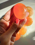 Peach Selenite Palm Stones